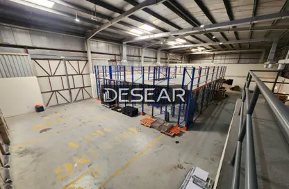 Warehouse - Studio - 2 Bathrooms for rent in Block A - Umm Ramool - Dubai