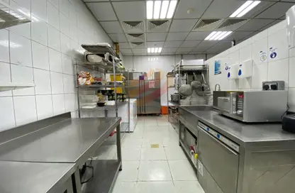 Kitchen image for: Shop - Studio for rent in Al Mushrif - Abu Dhabi, Image 1