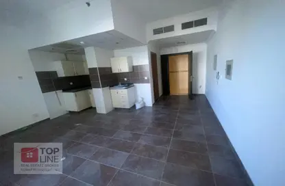 Empty Room image for: Apartment - 1 Bathroom for rent in Edmonton Elm - Jumeirah Village Triangle - Dubai, Image 1