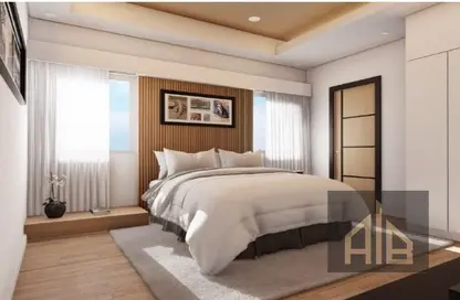 Room / Bedroom image for: Apartment - 1 Bedroom - 2 Bathrooms for sale in Garden Residences - Emirates City - Ajman, Image 1
