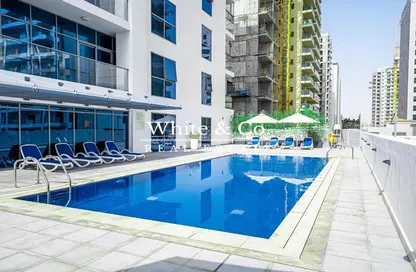 Pool image for: Apartment - 1 Bathroom for sale in Dezire Residences - Jumeirah Village Circle - Dubai, Image 1