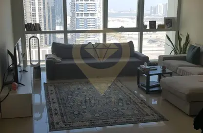 Living Room image for: Apartment - 1 Bedroom - 2 Bathrooms for sale in Tala Tower - Marina Square - Al Reem Island - Abu Dhabi, Image 1