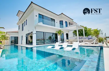Pool image for: Villa - 4 Bedrooms - 5 Bathrooms for sale in Frond C - Garden Homes - Palm Jebel Ali - Dubai, Image 1