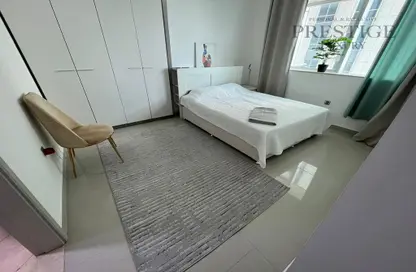 Room / Bedroom image for: Apartment - 1 Bedroom - 2 Bathrooms for sale in Marina Pinnacle - Dubai Marina - Dubai, Image 1