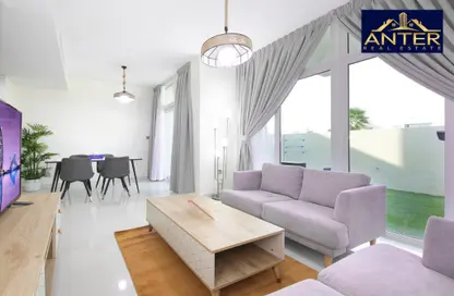 Living / Dining Room image for: Townhouse - 3 Bedrooms - 3 Bathrooms for rent in Aknan Villas - Vardon - Damac Hills 2 - Dubai, Image 1