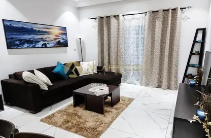 Living Room image for: Apartment - 1 Bedroom - 2 Bathrooms for sale in Al Ghaf 1 - Arjan - Dubai, Image 1