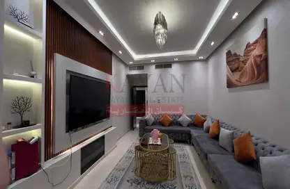 Living Room image for: Apartment - 2 Bedrooms - 3 Bathrooms for sale in Yasmin Village - Ras Al Khaimah, Image 1