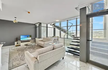 Living Room image for: Duplex - 2 Bedrooms - 3 Bathrooms for sale in Al Raha Lofts - Al Raha Beach - Abu Dhabi, Image 1