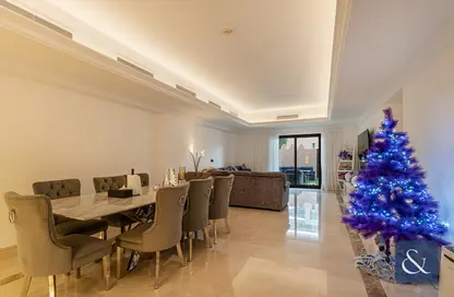 Living / Dining Room image for: Apartment - 3 Bedrooms - 4 Bathrooms for sale in The Fairmont Palm Residence North - The Fairmont Palm Residences - Palm Jumeirah - Dubai, Image 1