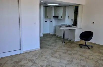 Apartment - Studio - 1 Bathroom for rent in Barton House 1 - Barton House - Motor City - Dubai