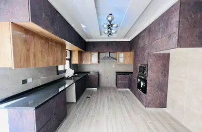 Villa - 5 Bedrooms - 6 Bathrooms for sale in Al Suyoh 1 - Al Suyoh - Sharjah