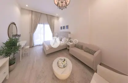 Living Room image for: Apartment - 1 Bathroom for sale in Mayas Geneva - Jumeirah Village Circle - Dubai, Image 1