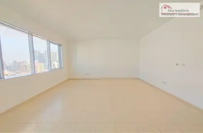Empty Room image for: Apartment - 4 Bedrooms - 6 Bathrooms for rent in Al Wahda Street - Al Wahda - Abu Dhabi, Image 1