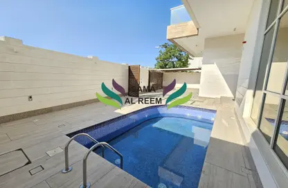 Pool image for: Villa - 6 Bedrooms - 7 Bathrooms for rent in Jumeirah 1 Villas - Jumeirah 1 - Jumeirah - Dubai, Image 1