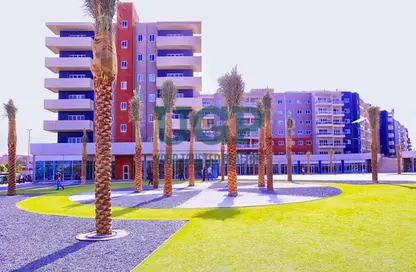Outdoor Building image for: Apartment - 2 Bedrooms - 2 Bathrooms for sale in Tower 24 - Al Reef Downtown - Al Reef - Abu Dhabi, Image 1