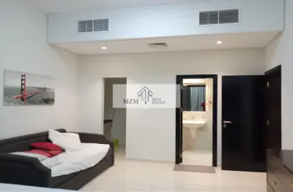 Living Room image for: Apartment - 1 Bedroom - 2 Bathrooms for rent in Ewan Residence 1 - Ewan Residences - Dubai Investment Park - Dubai, Image 1