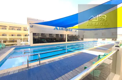 Pool image for: Apartment - 1 Bedroom - 2 Bathrooms for rent in Al Amir Residence - Jumeirah Village Circle - Dubai, Image 1
