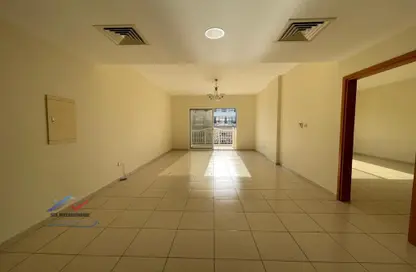 Empty Room image for: Apartment - 1 Bedroom - 2 Bathrooms for rent in Magnolia 1 - Emirates Gardens 2 - Jumeirah Village Circle - Dubai, Image 1