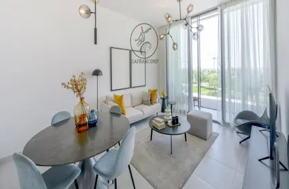 Living / Dining Room image for: Apartment - 2 Bedrooms - 3 Bathrooms for sale in Vida Residences - Aljada - Sharjah, Image 1