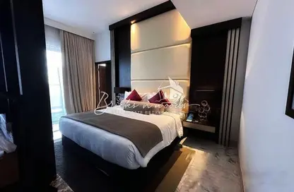 Room / Bedroom image for: Apartment - 1 Bathroom for sale in TFG One Hotel - Dubai Marina - Dubai, Image 1