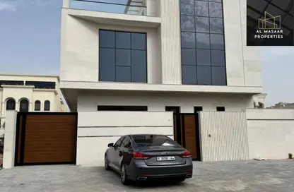 Villa - 5 Bedrooms - 7 Bathrooms for sale in Ajman Global City - Al Alia - Ajman