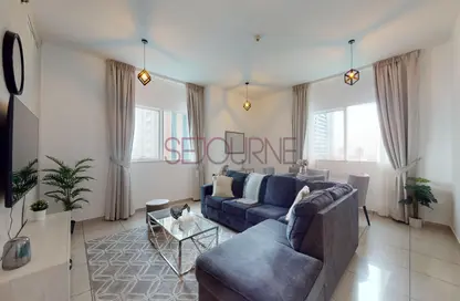 Living Room image for: Apartment - 2 Bedrooms - 2 Bathrooms for rent in Marina Pinnacle - Dubai Marina - Dubai, Image 1