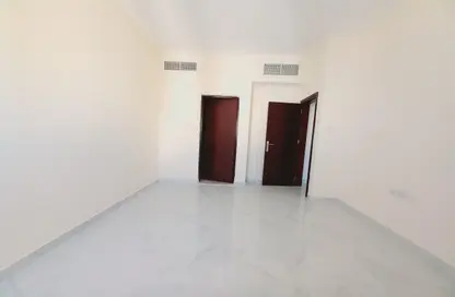 Empty Room image for: Apartment - 2 Bedrooms - 2 Bathrooms for rent in Muwaileh Commercial - Sharjah, Image 1