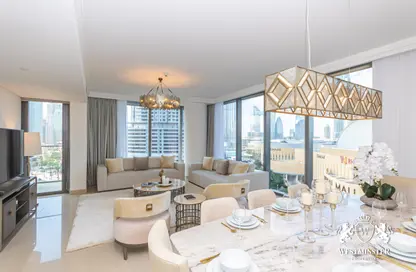 Living / Dining Room image for: Apartment - 3 Bedrooms - 4 Bathrooms for sale in Boulevard Point - Downtown Dubai - Dubai, Image 1