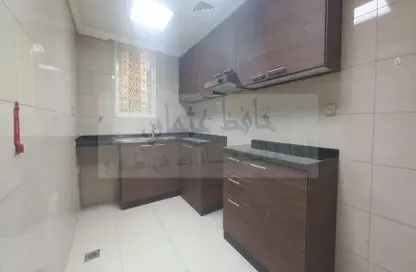 صورة لـ مطبخ شقة - 2 غرف نوم - 2 حمامات للايجار في الروضة - أبوظبي ، صورة رقم 1