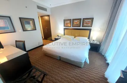 Room / Bedroom image for: Apartment - 1 Bedroom - 2 Bathrooms for rent in Farha Tower - Tourist Club Area - Abu Dhabi, Image 1