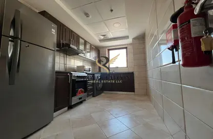 Kitchen image for: Apartment - 2 Bedrooms - 3 Bathrooms for rent in Rokane G22 - Jumeirah Village Circle - Dubai, Image 1