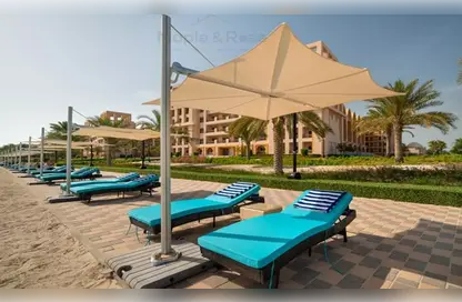 Pool image for: Apartment - 1 Bedroom - 2 Bathrooms for rent in Sarai Apartments - Palm Jumeirah - Dubai, Image 1