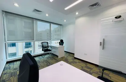 Office Space - Studio - 4 Bathrooms for rent in Hamdan Street - Abu Dhabi
