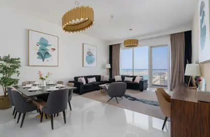 Living / Dining Room image for: Apartment - 3 Bedrooms - 3 Bathrooms for rent in Avani Palm View Hotel  and  Suites - Dubai Media City - Dubai, Image 1