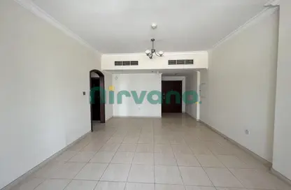 Empty Room image for: Apartment - 1 Bedroom - 2 Bathrooms for rent in Art 8 - Barsha Heights (Tecom) - Dubai, Image 1