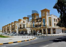 Outdoor Building image for: Shop - 1 bathroom for rent in The Grand Avenue - Al Nasreya - Sharjah, Image 1