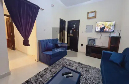 Living Room image for: Apartment - 1 Bedroom - 2 Bathrooms for rent in Ideal 1 - Al Rawda 3 - Al Rawda - Ajman, Image 1