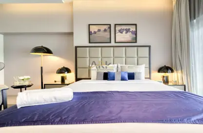 صورة لـ غرفة- غرفة النوم شقة - 1 حمام للايجار في داماك ماجستين - الخليج التجاري - دبي ، صورة رقم 1