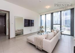 Living Room image for: Apartment - 1 bedroom - 2 bathrooms for sale in BLVD Heights Tower 1 - BLVD Heights - Downtown Dubai - Dubai, Image 1