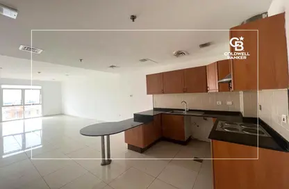 صورة لـ مطبخ شقة - 2 غرف نوم - 2 حمامات للبيع في واحة الينابيع - واحة السيليكون - دبي ، صورة رقم 1
