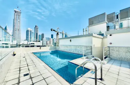 Apartment - 1 Bedroom - 2 Bathrooms for rent in Jumeirah Garden City - Al Satwa - Dubai
