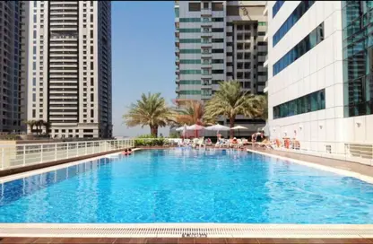 Pool image for: Apartment - 1 Bedroom - 2 Bathrooms for rent in MAG 218 - Dubai Marina - Dubai, Image 1