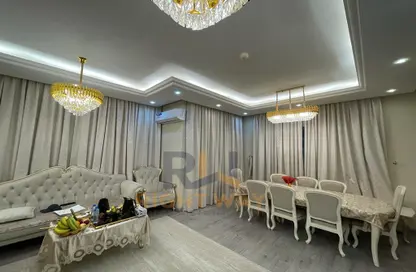 Living / Dining Room image for: Apartment - 3 Bedrooms - 5 Bathrooms for sale in Bawabat Al Sharq - Baniyas East - Baniyas - Abu Dhabi, Image 1