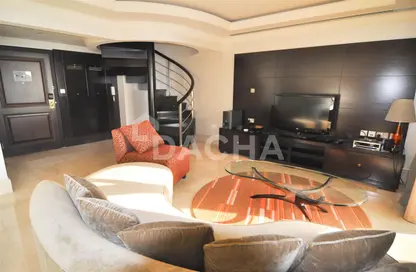 Living Room image for: Duplex - 1 Bedroom - 2 Bathrooms for rent in Murjan 4 - Murjan - Jumeirah Beach Residence - Dubai, Image 1