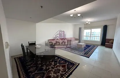 Living / Dining Room image for: Apartment - 2 Bedrooms - 2 Bathrooms for rent in Sonya Tower - Sheikh Khalifa Bin Zayed Street - Ajman, Image 1