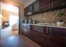 Kitchen image for: Studio - 1 bathroom for rent in Jannah Burj Al Sarab - Mina Road - Tourist Club Area - Abu Dhabi, Image 1