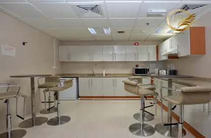 Kitchen image for: Office Space - Studio - 4 Bathrooms for rent in Defense Road - Abu Dhabi, Image 1