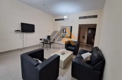Living Room image for: Apartment - 2 Bedrooms - 3 Bathrooms for rent in Horizon Towers - Ajman Downtown - Ajman, Image 1