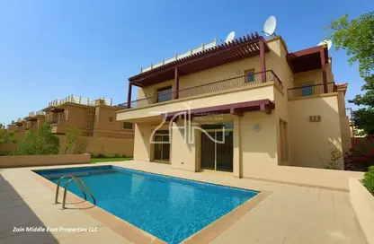 Pool image for: Villa - 6 Bedrooms for rent in Orchid - Al Raha Golf Gardens - Abu Dhabi, Image 1