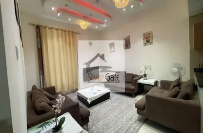 Living Room image for: Apartment - 1 Bedroom - 2 Bathrooms for rent in City Tower - Al Nuaimiya - Ajman, Image 1